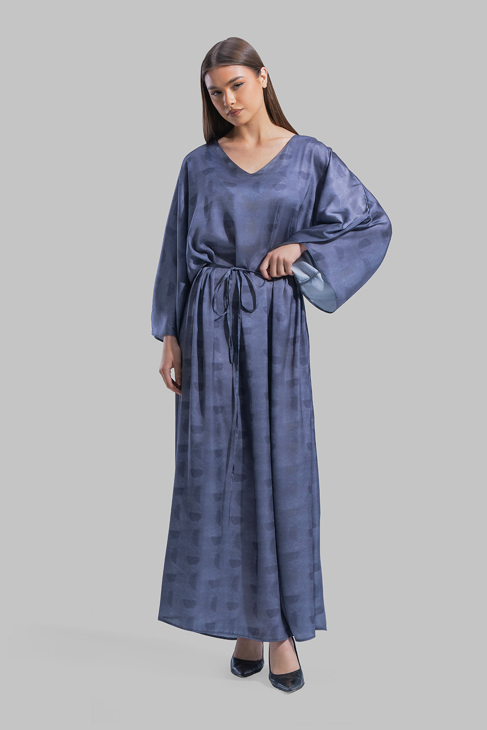 Oversized maxi dress featuring a V-neckline and wide kimono-style sleeves.
