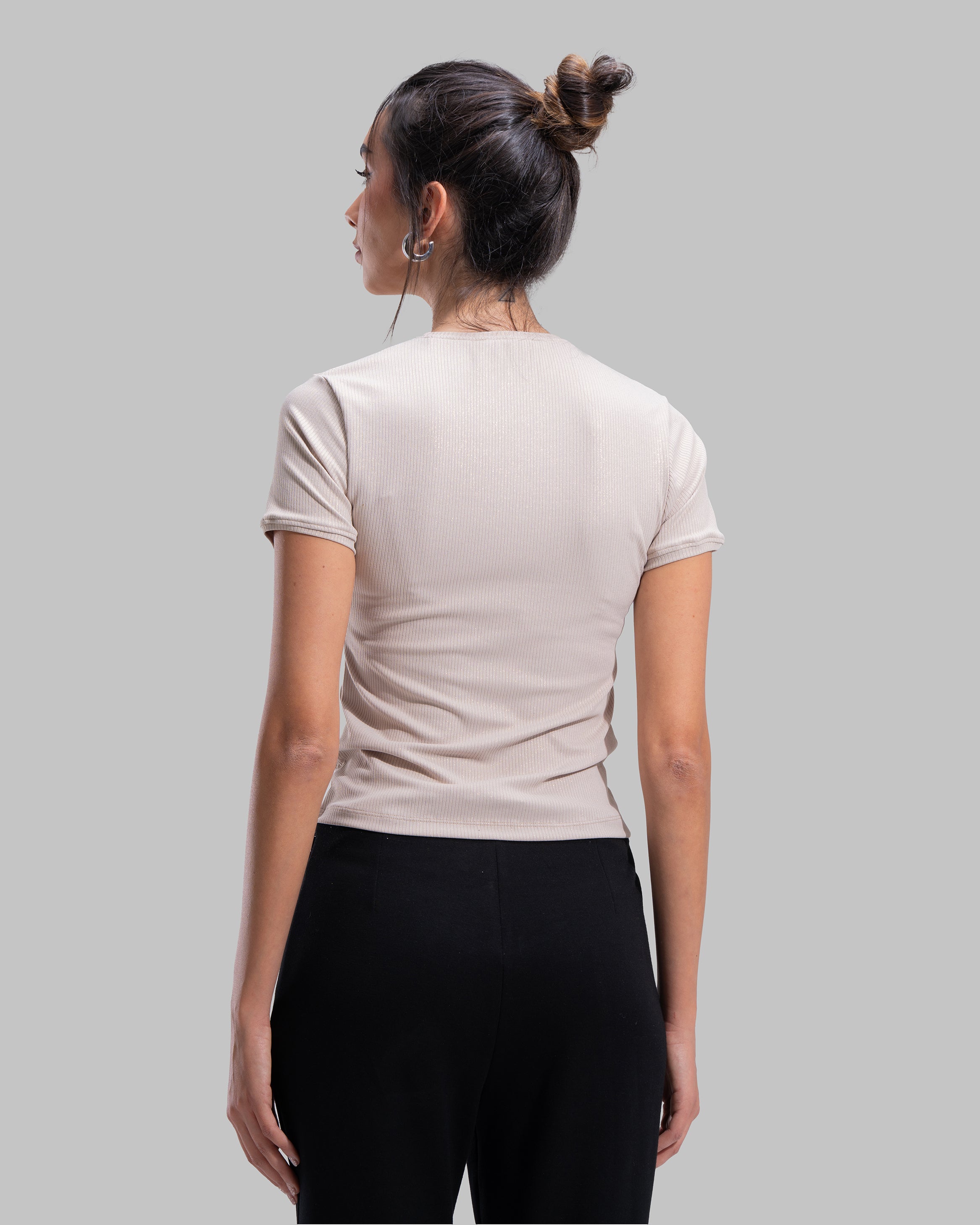Short sleeve ribbed top with a shimmering metallic finish and round neck.