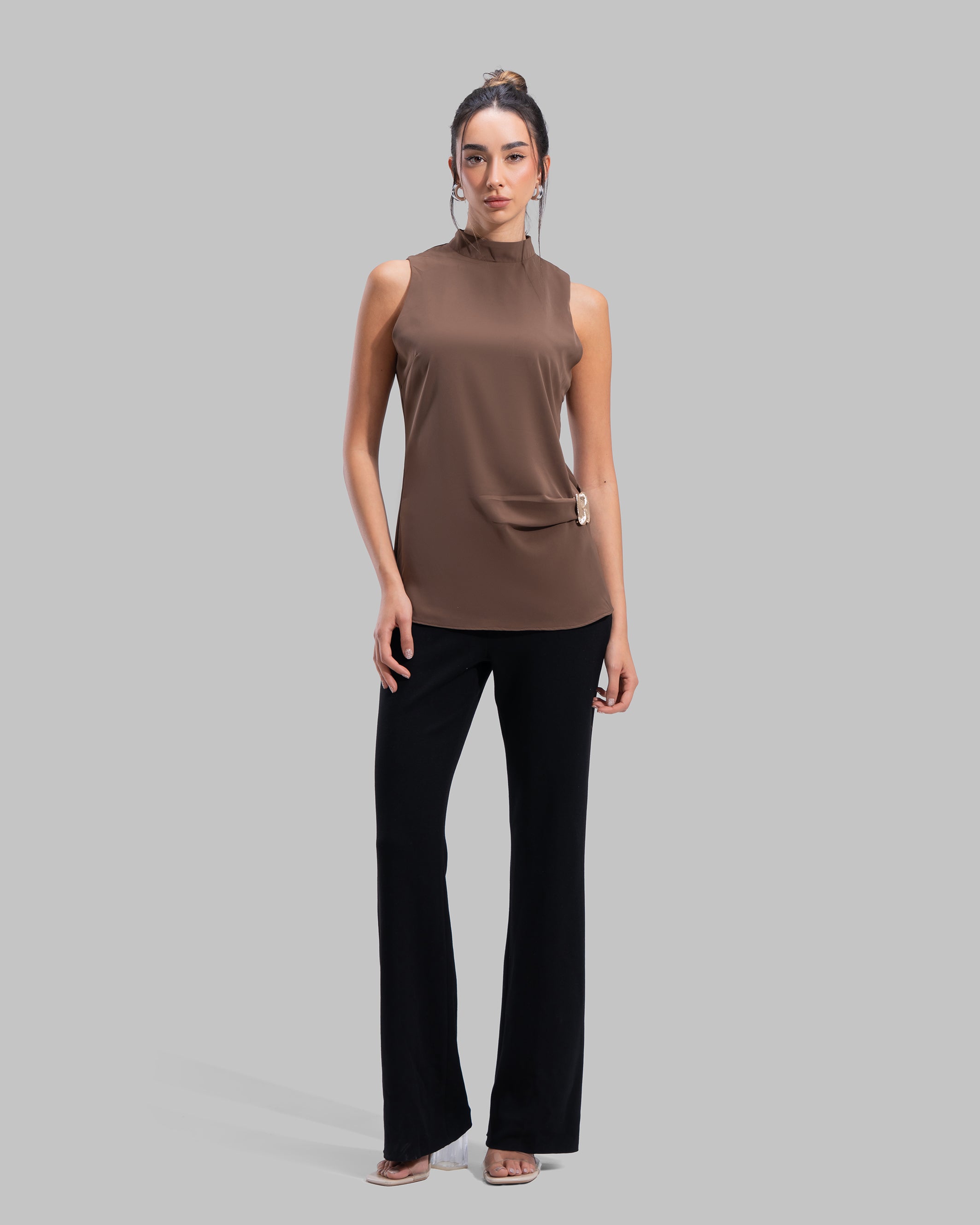 Sleeveless ribbed tank top with a metallic thread finish and a round neck.