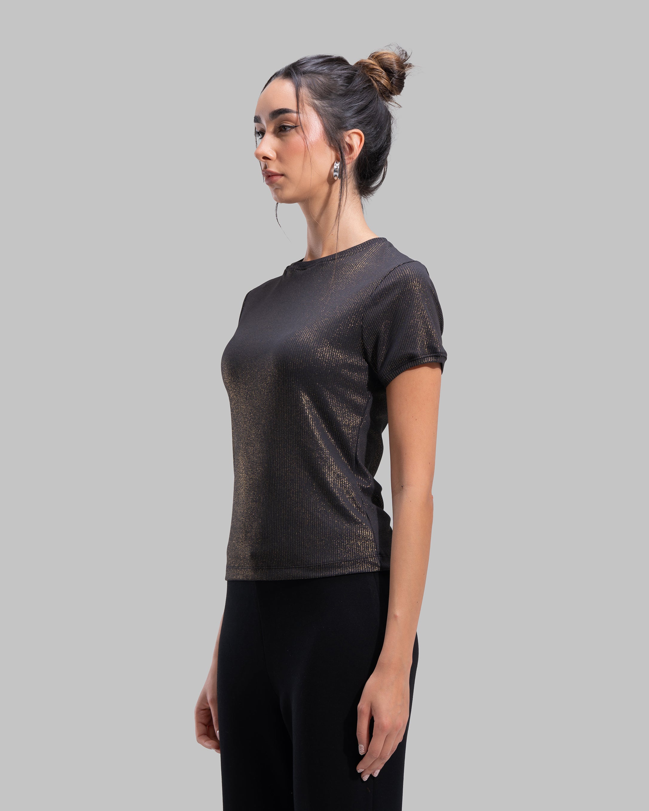 Short sleeve ribbed top with a shimmering metallic finish and round neck.