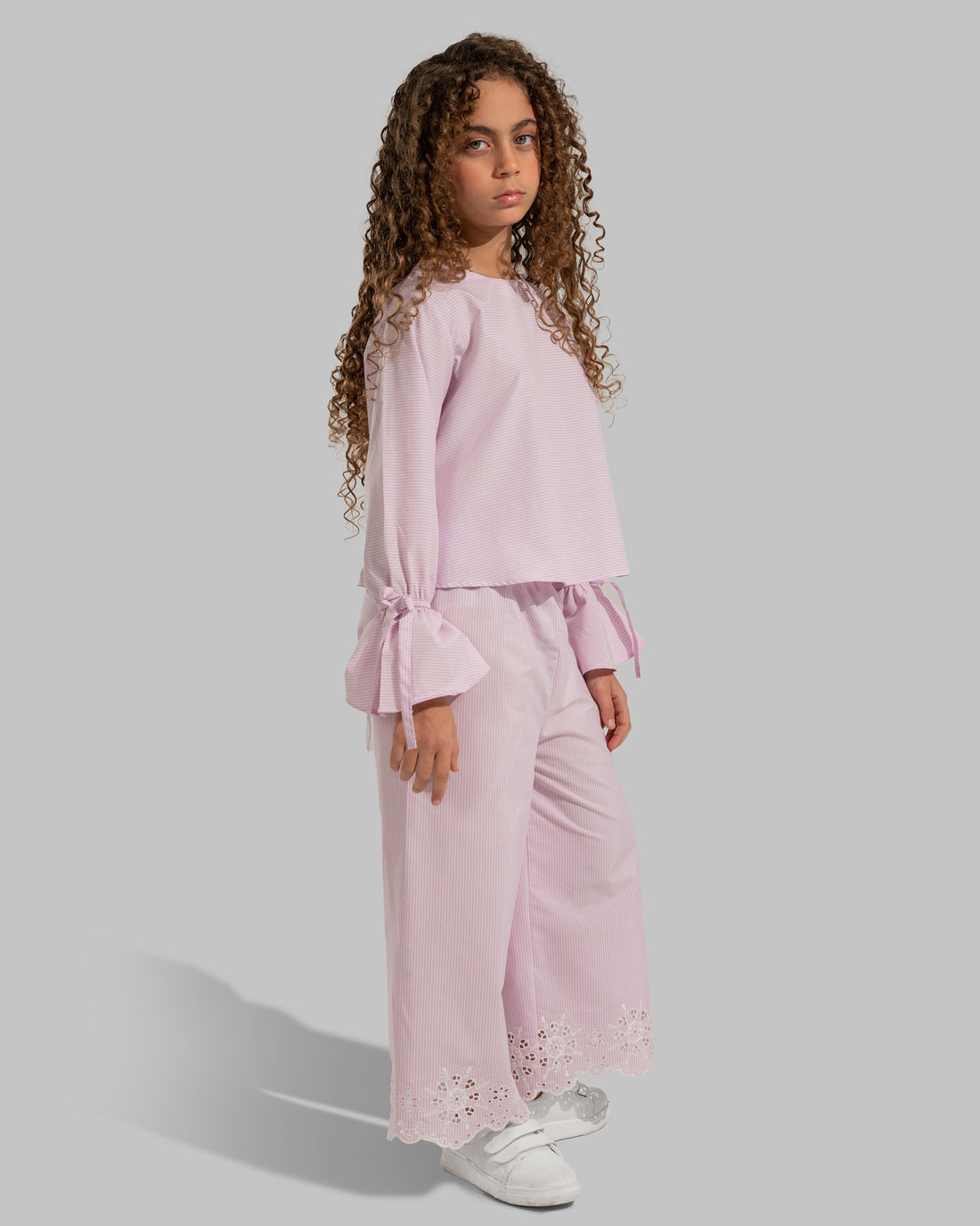 Striped straight-leg trousers with embroidered hems