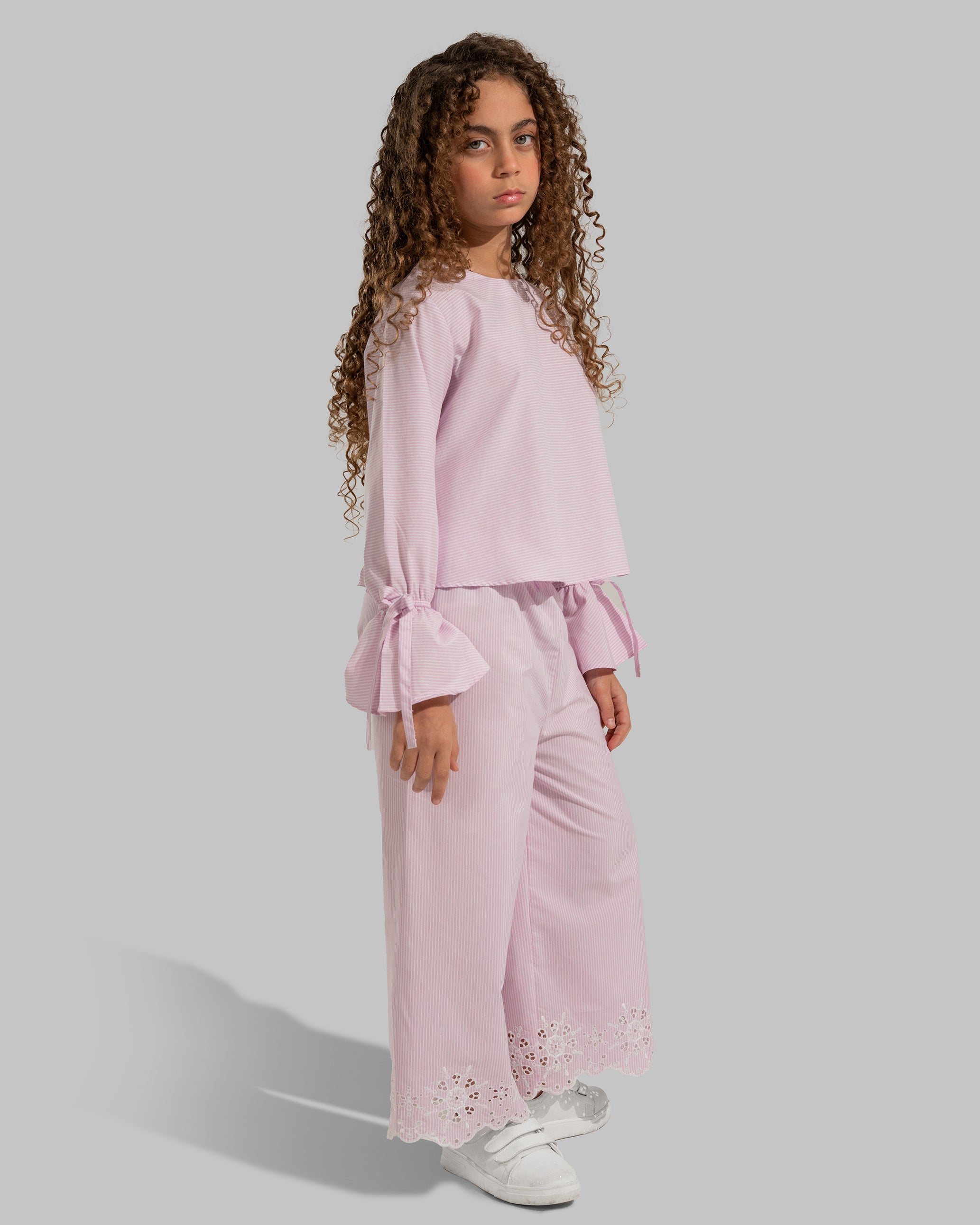 Striped straight-leg trousers with embroidered hems