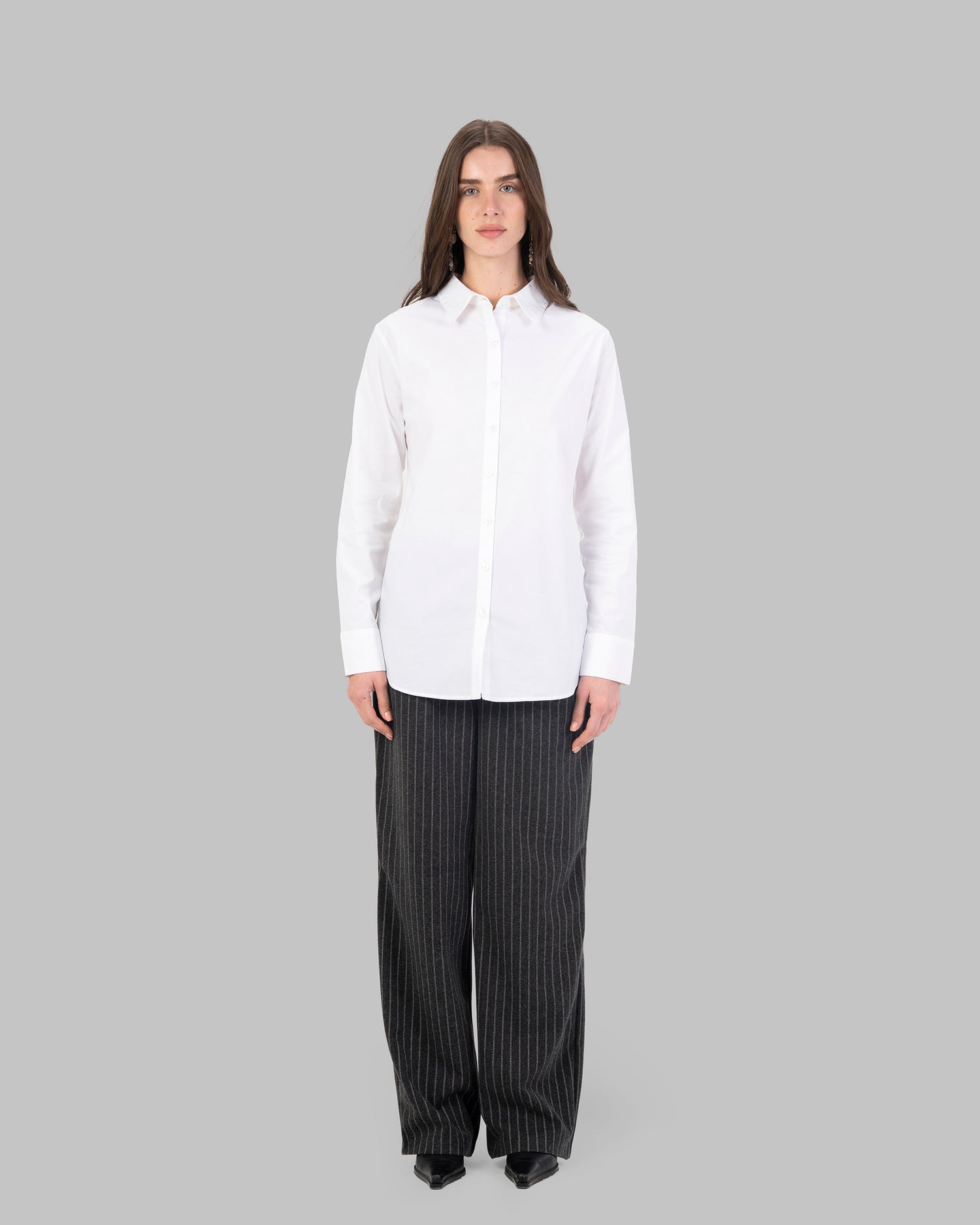 Oversize white collared shirt.
