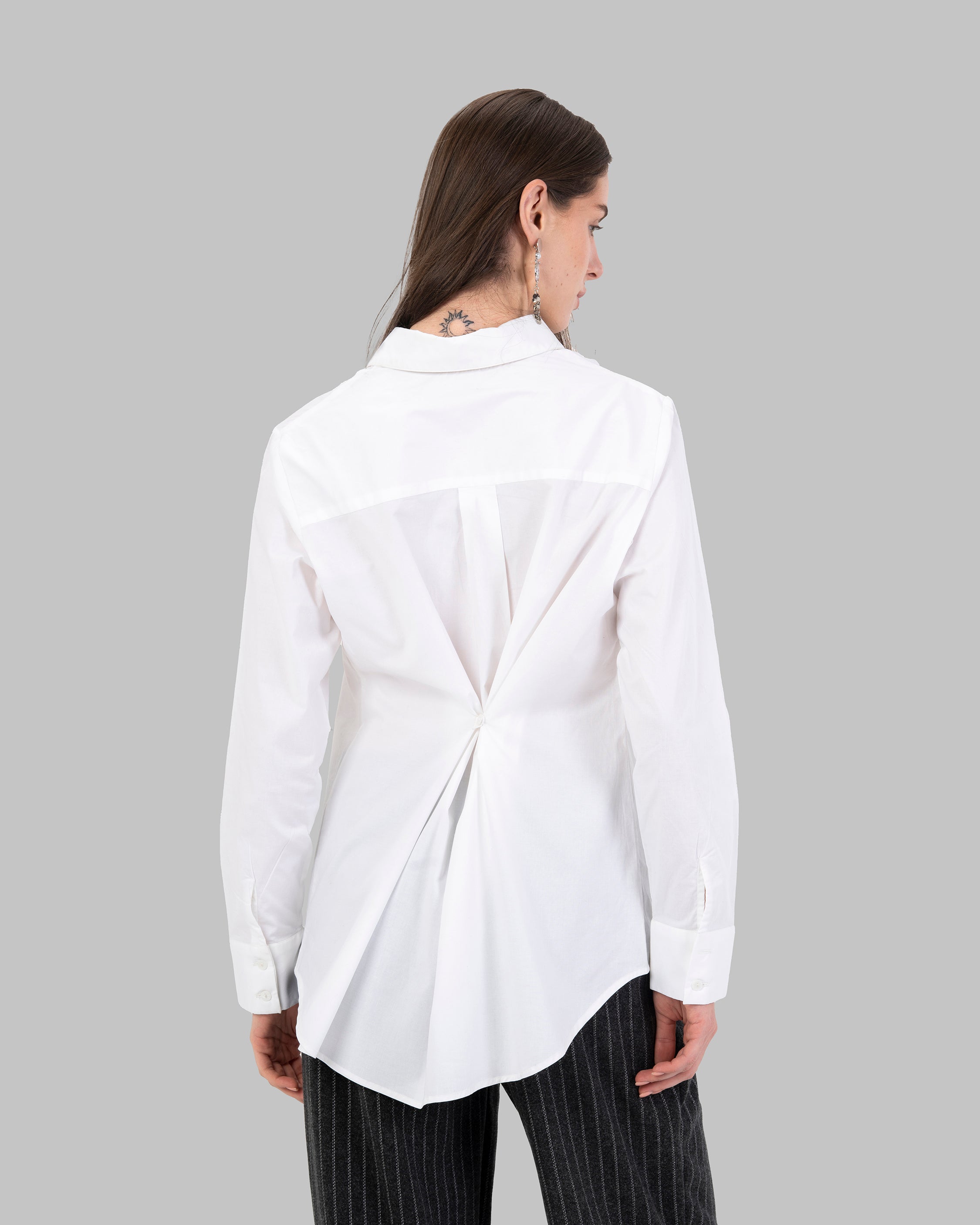 Oversize white collared shirt.