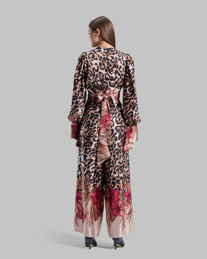 Long sleeve top with a draped neckline and slightly puffed shoulders.