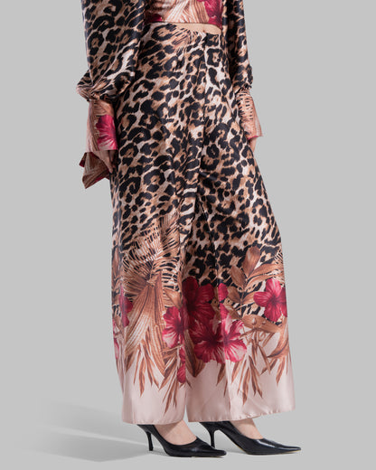 Long sleeve top with a draped neckline and slightly puffed shoulders.