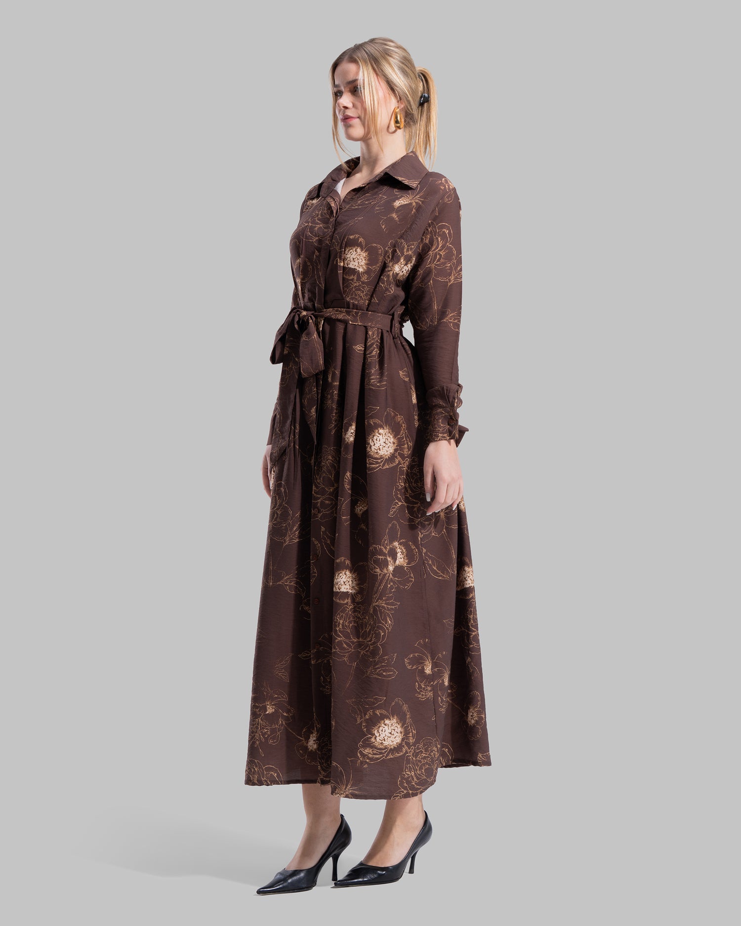 Floral print midi shirt dress with a matching tie belt at the waist.