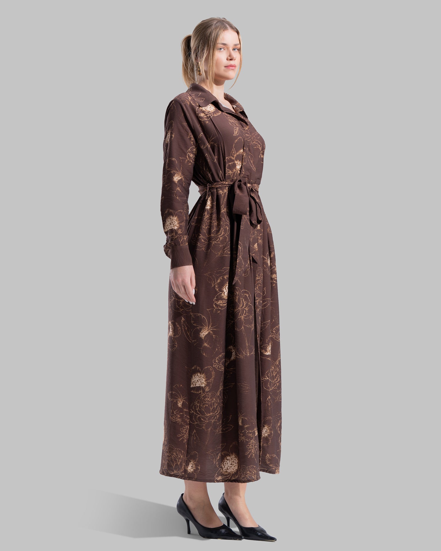 Floral print midi shirt dress with a matching tie belt at the waist.