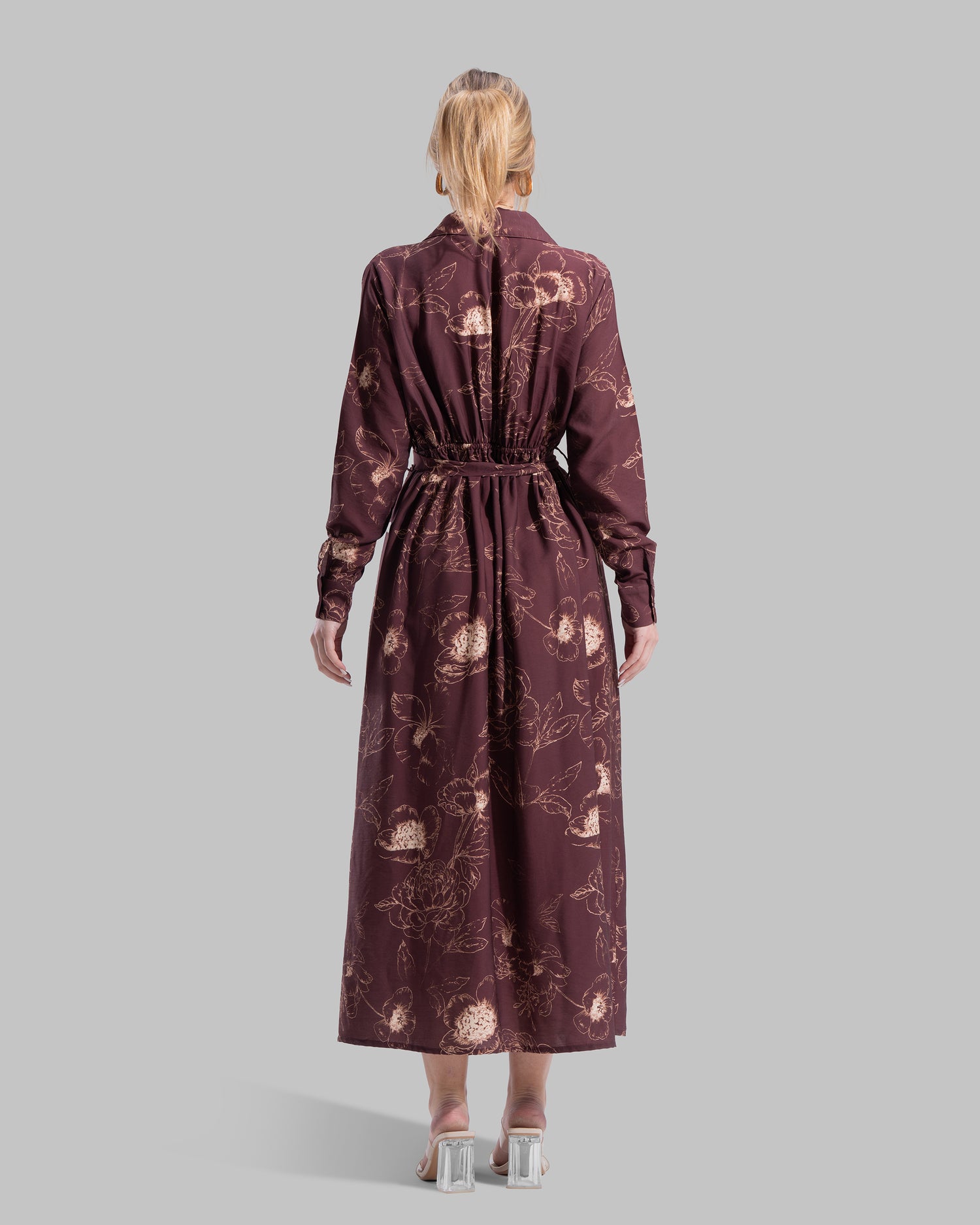 Floral print midi shirt dress with a matching tie belt at the waist.