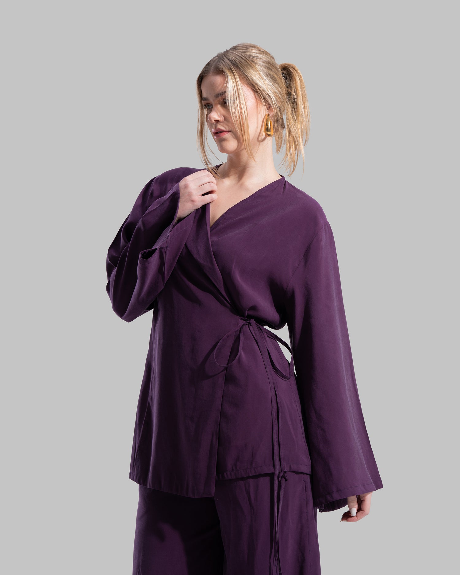 Oversized wrap-style cardigan with a lapel collar