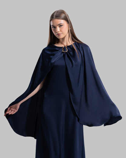 Long dress made of a flowing satin-finish fabric.