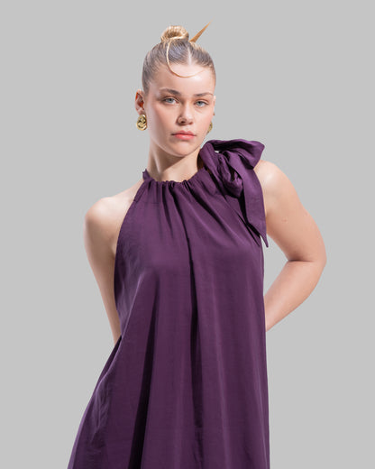 Long dress with a halter neckline.