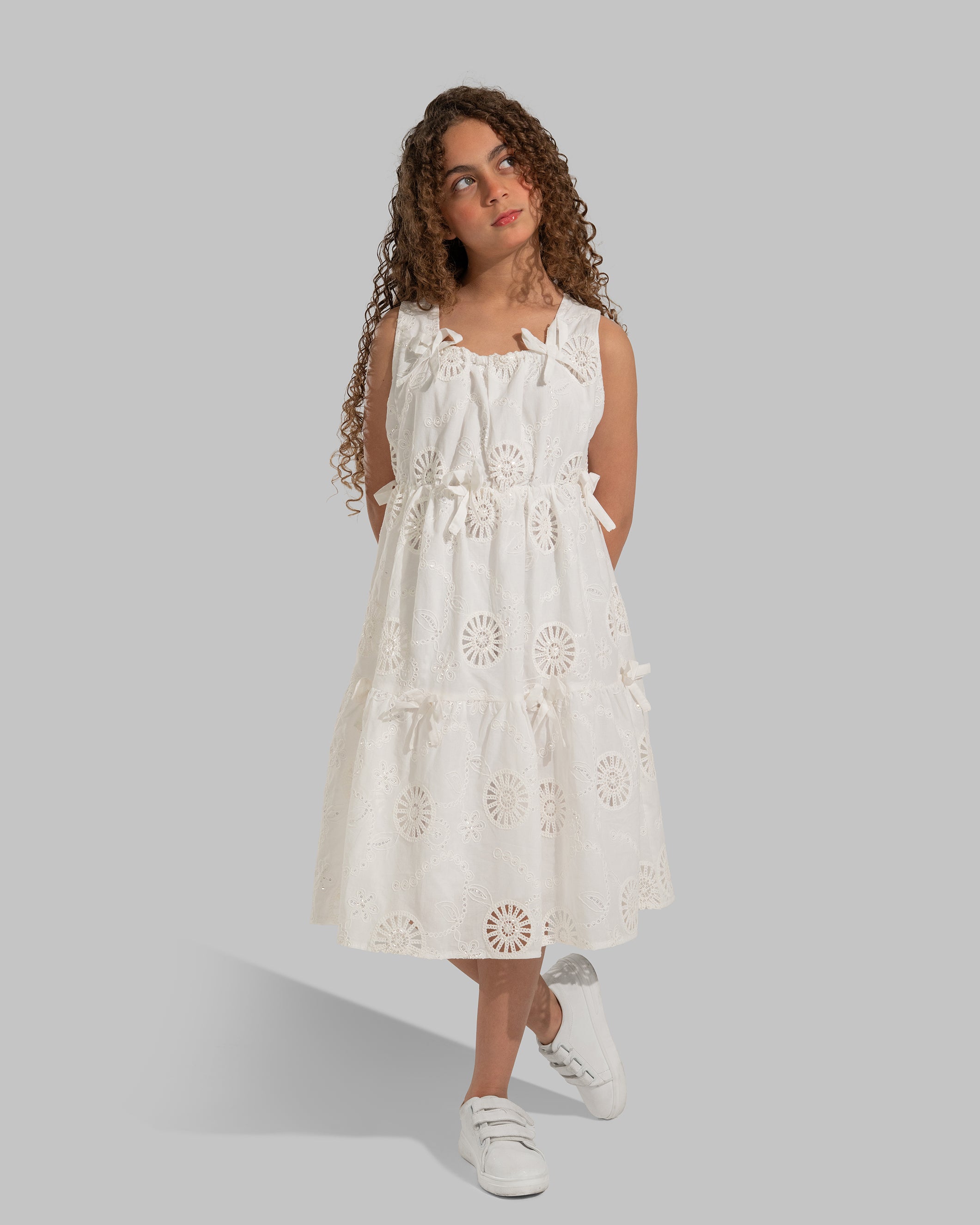 White eyelet midi dress with delicate bow details