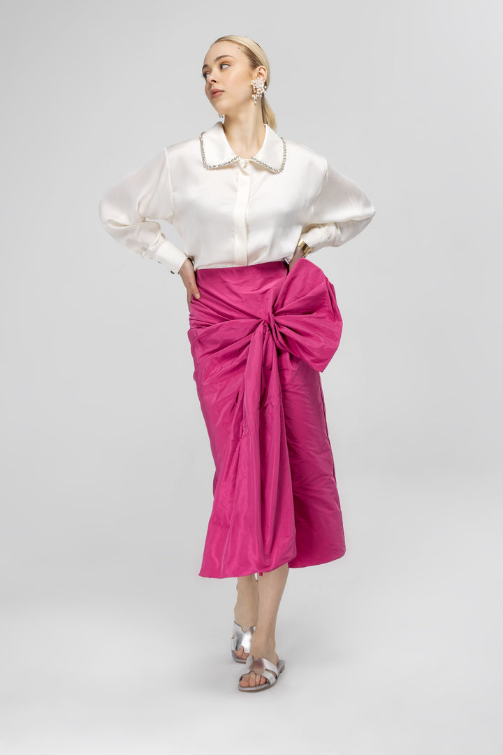 Cross skirt with bow detail